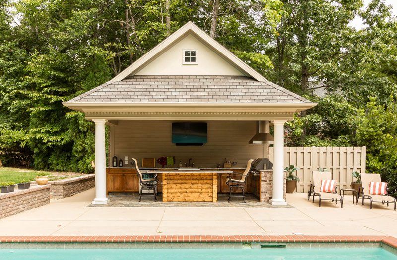 Exterior of a Charlotte home addition with new roofline and large windows